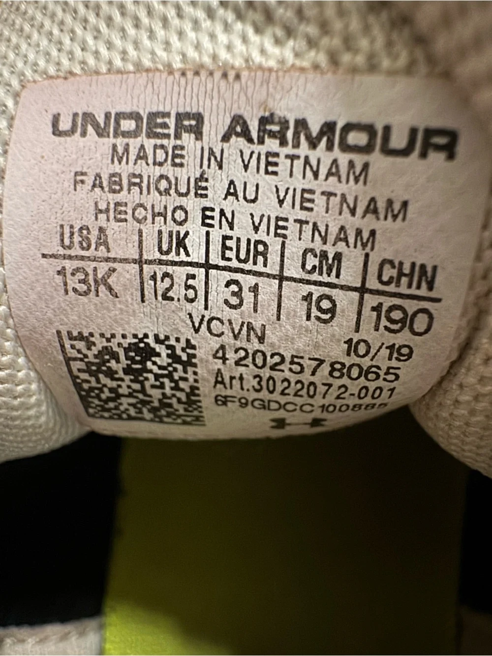 Under Armour Kids Black and Cream Sneakers with Pink Laces